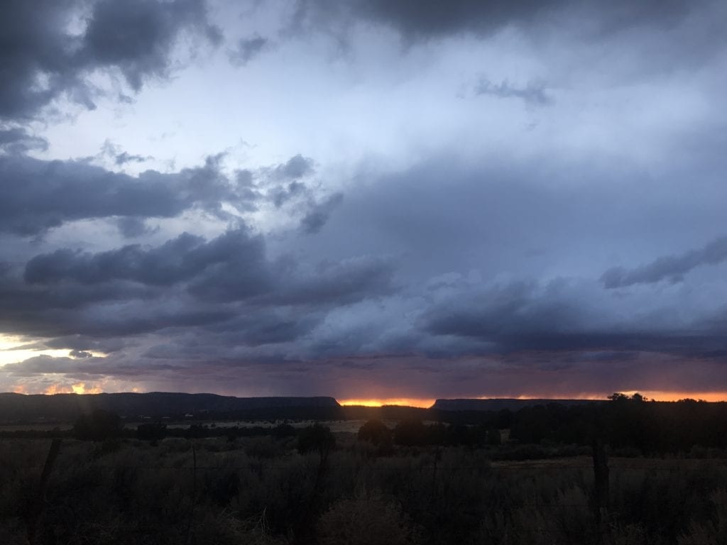 Glowy and cloudy skies can often signal the onset of a storm.