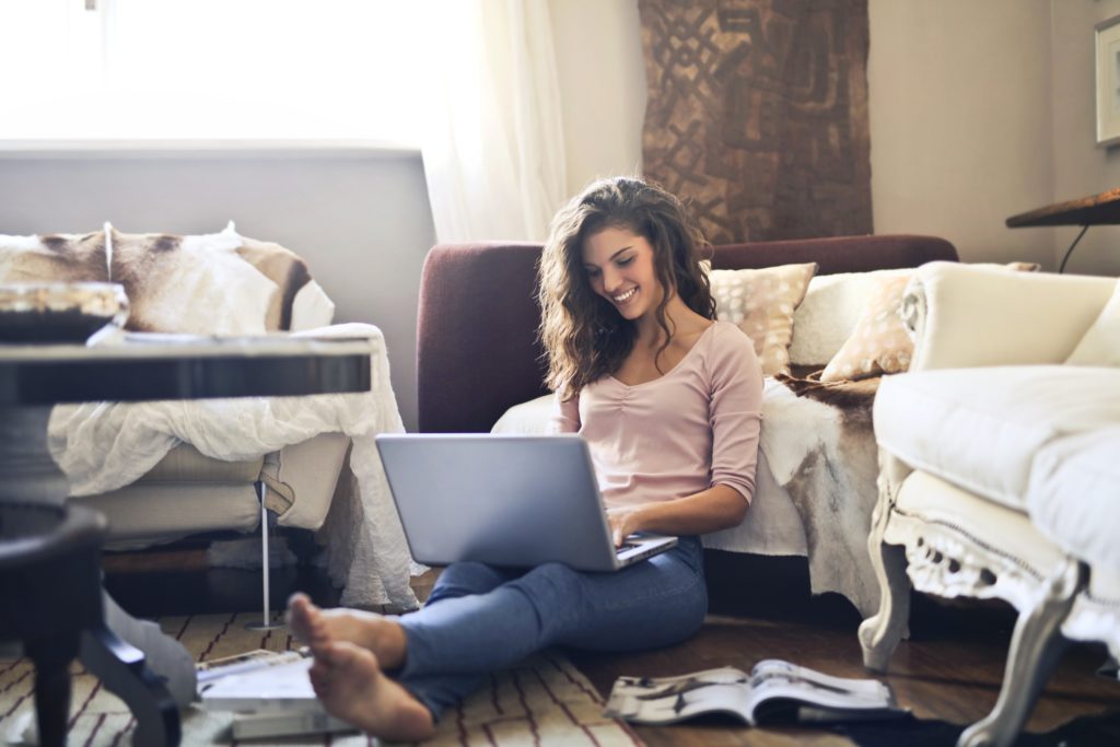 wp-content-uploads-2020-03-woman-smiling-while-using-laptop-3769717-1024x683.jpg