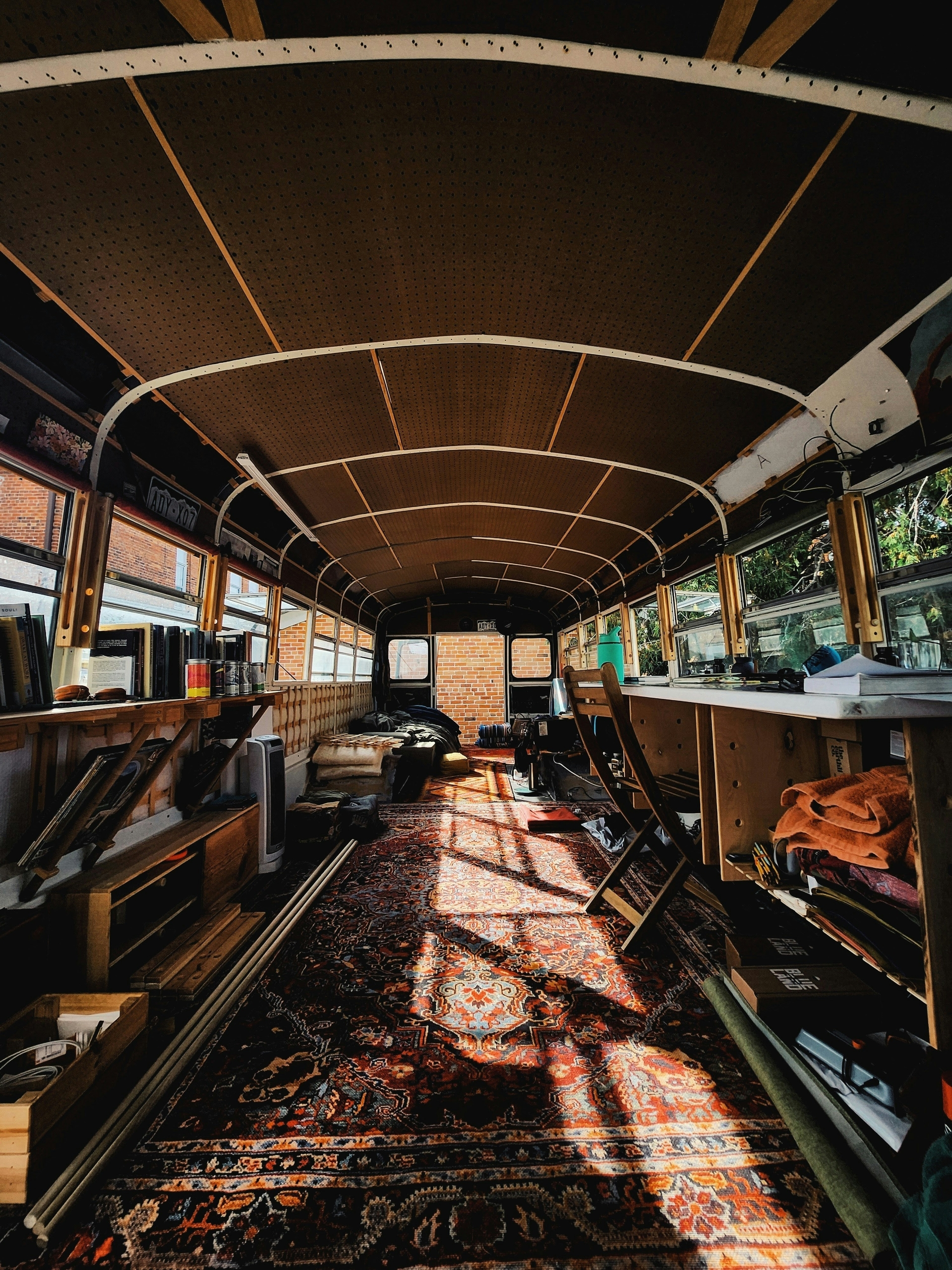 Skoolie Interior Photo by ModCatShop on Unsplash